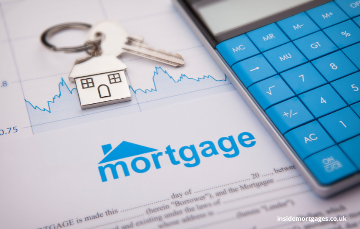Mortgage application document with metal house key ring on top